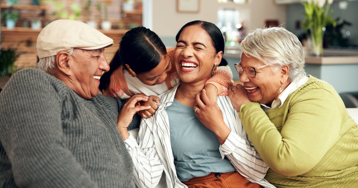 Happy diverse family with elderly grandparents and adult children celebrating together
