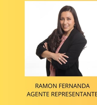 Professional headshot of Ramon Fernanda, a female real estate agent in business attire with arms crossed, smiling at the camera