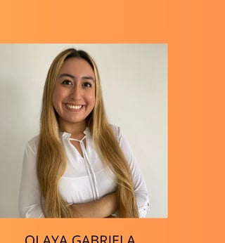 Professional headshot of Olaya Gabriela, a woman with long blonde hair wearing a white collared shirt, smiling at the camera against an orange background
