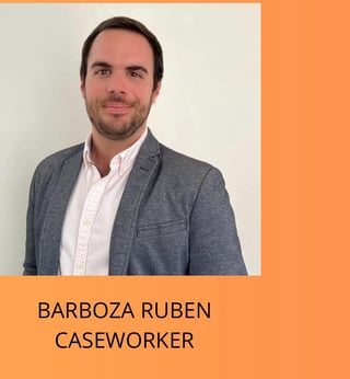 Professional headshot of Barboza Ruben, a caseworker, wearing a gray blazer and white shirt