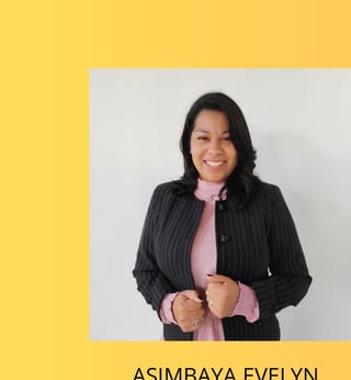 Professional headshot of Asimraya Evelyn, woman with long black hair wearing a black pinstriped blazer and pink top, smiling at camera against yellow and white background